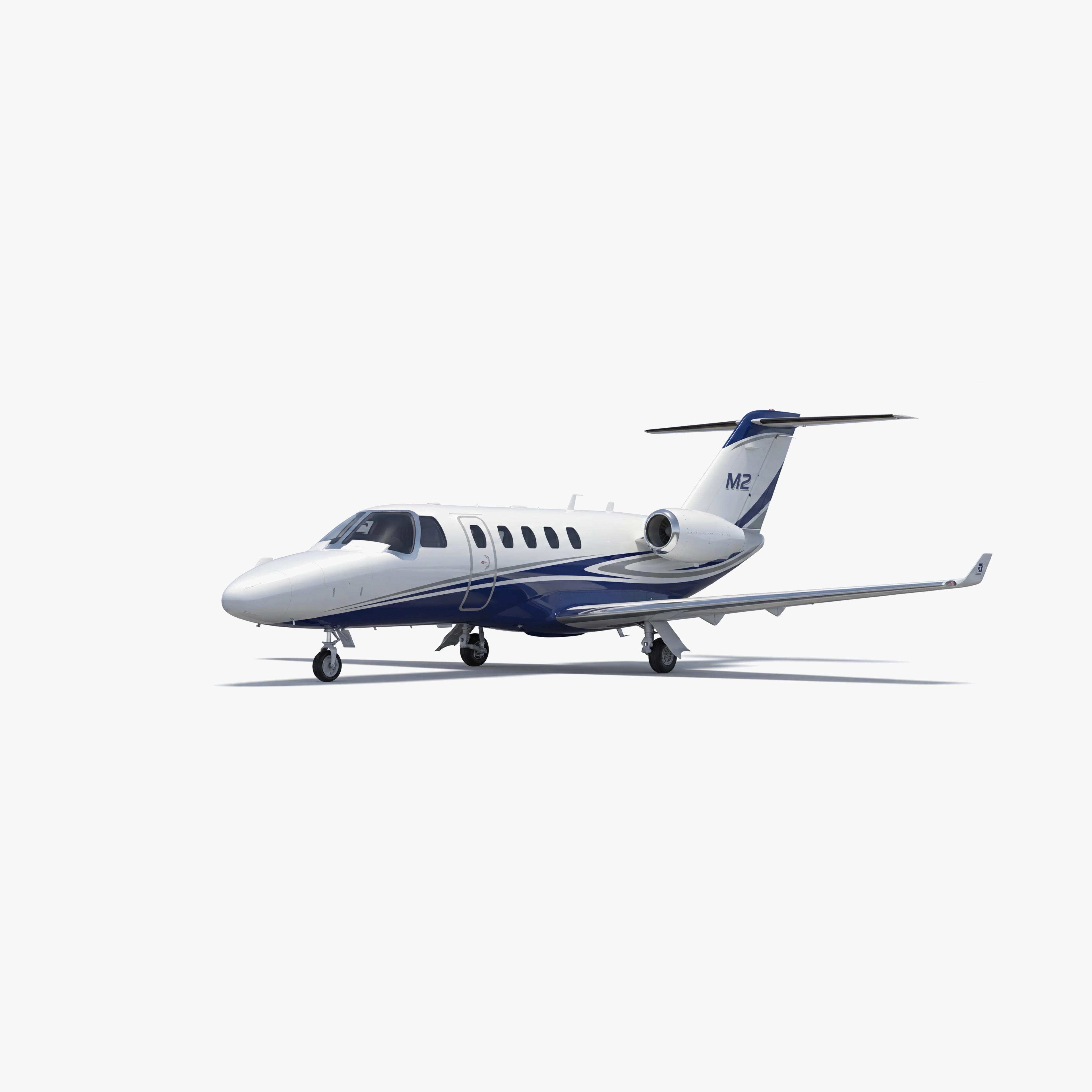 Citation M2 light jet with white fuselage and blue accent stripes parked on clean white background