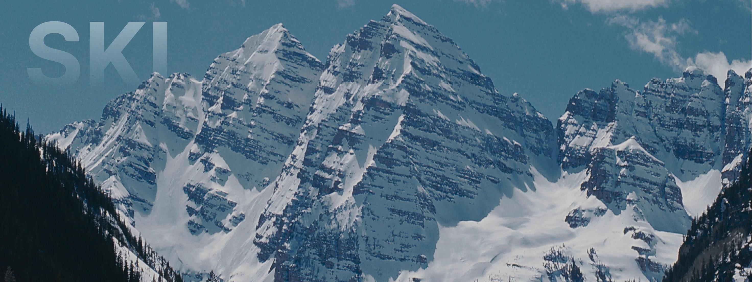 阿斯彭雪山峰峦与常青森林构成壮丽高山景观