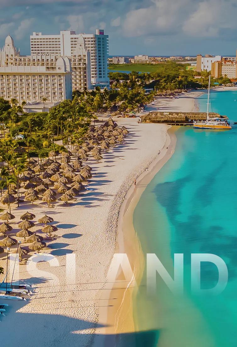 Stunning aerial view of Nassau's pristine turquoise waters, white sand beaches, and luxury resorts