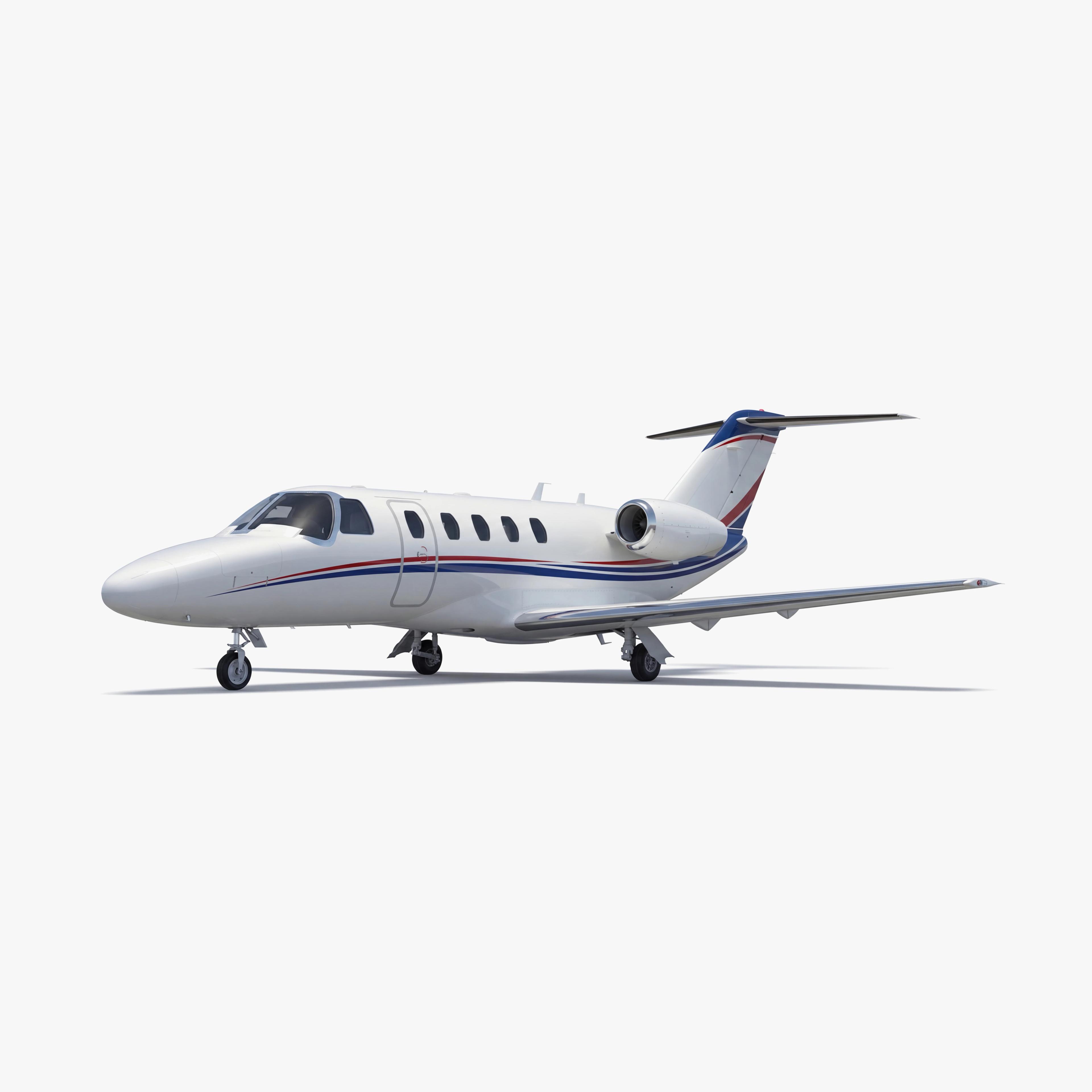 White Citation CJ2+ light jet with blue and red accent stripes parked on clean surface against neutral background