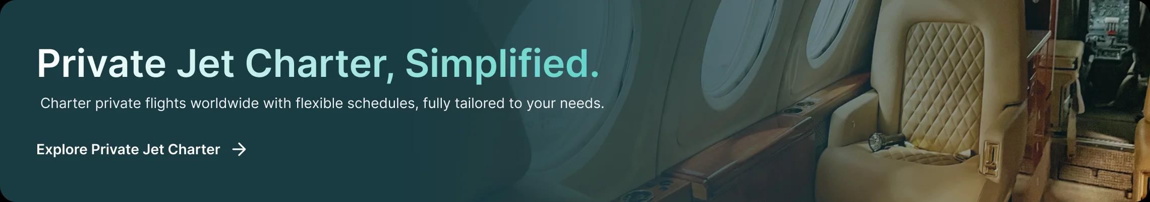 Luxurious private jet cabin interior with cream leather seats and polished wood finishes