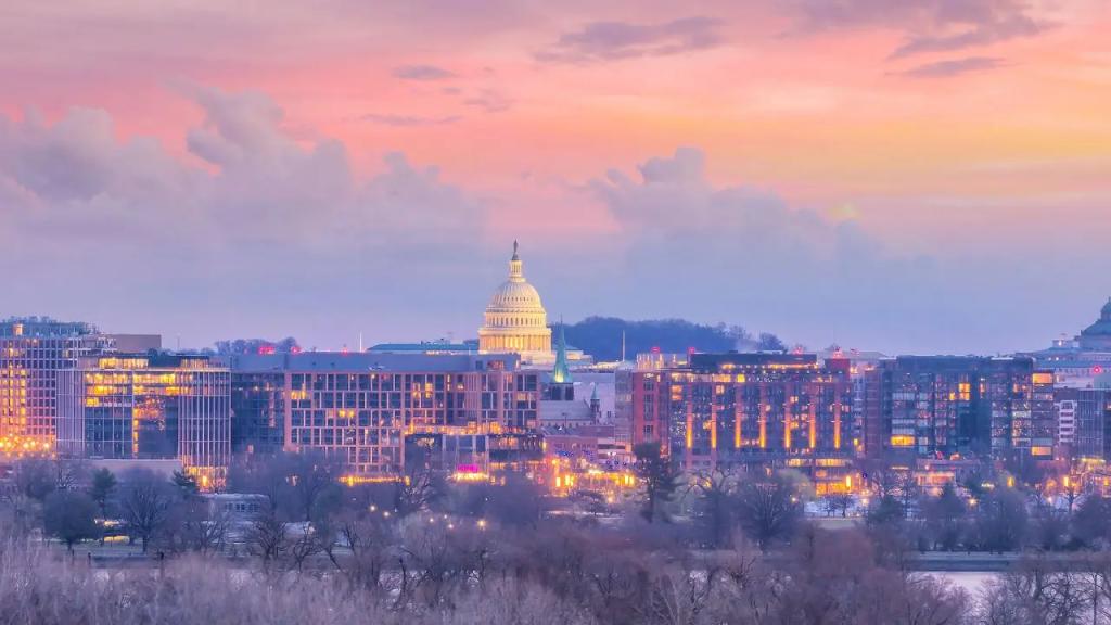 Washington DC skyline at sunset with illuminated Capitol dome, showcasing premium empty leg flight destination